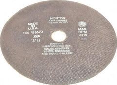 Norton - 10" 60 Grit Aluminum Oxide Cutoff Wheel - 0.06" Thick, 1-1/4" Arbor, 6,110 Max RPM, Use with Stationary Grinders - Eagle Tool & Supply