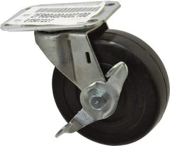 E.R. Wagner - 4" Diam x 1-1/4" Wide x 4-11/16" OAH Top Plate Mount Swivel Caster with Brake - Soft Rubber, 165 Lb Capacity, Delrin Bearing, 2-3/4 x 3-3/4" Plate - Eagle Tool & Supply
