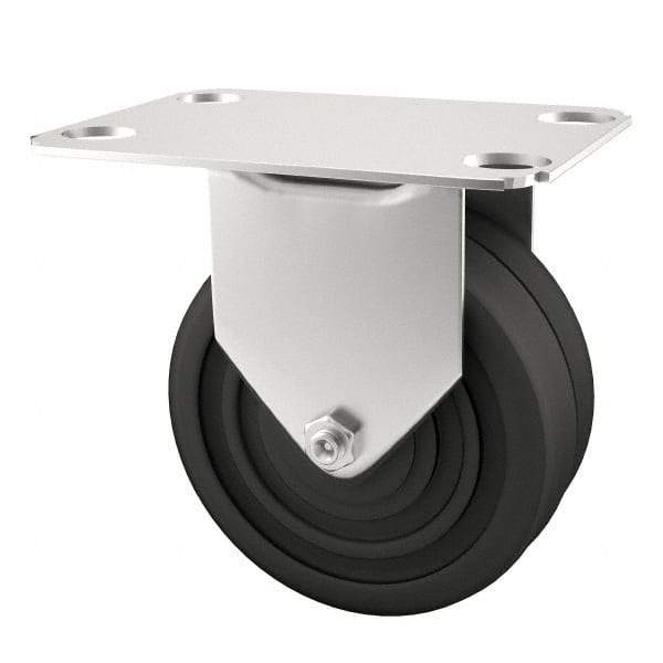 E.R. Wagner - 4" Diam x 1-1/4" Wide x 4-11/16" OAH Top Plate Mount Rigid Caster - Soft Rubber, 165 Lb Capacity, Delrin Bearing, 2-3/4 x 3-3/4" Plate - Eagle Tool & Supply