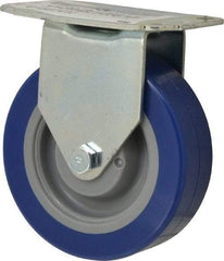 E.R. Wagner - 4" Diam x 1-1/4" Wide x 4-11/16" OAH Top Plate Mount Rigid Caster - Polyurethane, 275 Lb Capacity, Delrin Bearing, 2-3/4 x 3-3/4" Plate - Eagle Tool & Supply