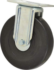 E.R. Wagner - 6" Diam x 1-3/8" Wide x 7-1/16" OAH Top Plate Mount Rigid Caster - Soft Rubber, 280 Lb Capacity, Delrin Bearing, 3-1/8 x 4-1/8" Plate - Eagle Tool & Supply