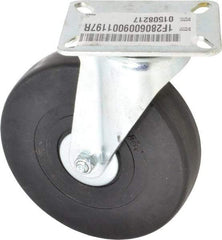 E.R. Wagner - 6" Diam x 1-3/8" Wide x 7-1/16" OAH Top Plate Mount Swivel Caster - Hard Rubber, 400 Lb Capacity, Delrin Bearing, 3-1/8 x 4-1/8" Plate - Eagle Tool & Supply