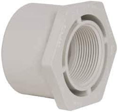 Value Collection - 2-1/2 x 1-1/2" PVC Plastic Pipe Bushing - Schedule 40, Spig x FIPT End Connections - Eagle Tool & Supply
