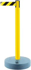 Tensator - 38" High, 2-1/2" Pole Diam, Barricade Tape Dispenser - 14" Base Diam, Round Plastic Base, Yellow Polymer Post, 7-1/2' x 1-7/8" Tape, Single Line Tape, For Outdoor Use - Eagle Tool & Supply