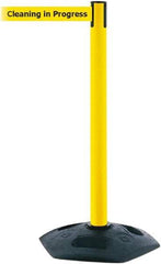 Tensator - 38" High, 2-1/2" Pole Diam, Barricade Tape Dispenser - 14" Base Diam, Round Rubber Base, Yellow Polymer Post, 7-1/2' x 1-7/8" Tape, Single Line Tape, For Outdoor Use - Eagle Tool & Supply