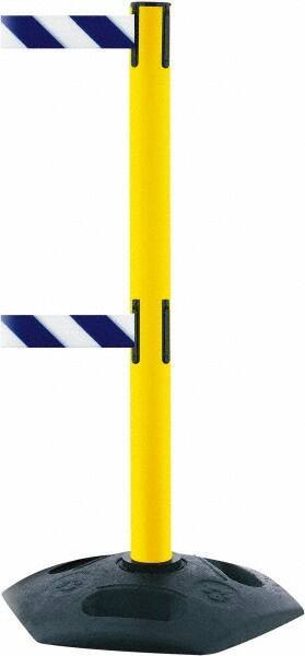 Tensator - 38" High, 2-1/2" Pole Diam, 4 Way Stanchion - 19" Base Diam, Octagon Recycled Rubber Base, Yellow Plastic Post, 7-1/2' x 2" Tape, Dual Line Tape, For Outdoor Use - Eagle Tool & Supply