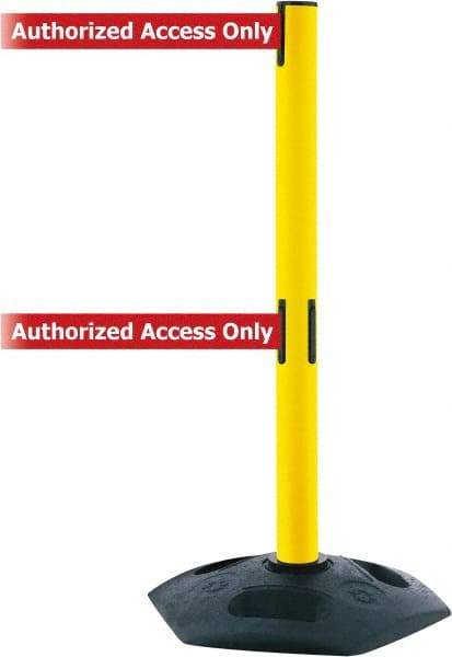 Tensator - 38" High, 2-1/2" Pole Diam, 4 Way Stanchion - 19" Base Diam, Octagon Recycled Rubber Base, Yellow Plastic Post, 13' x 2" Tape, Dual Line Tape, For Outdoor Use - Eagle Tool & Supply