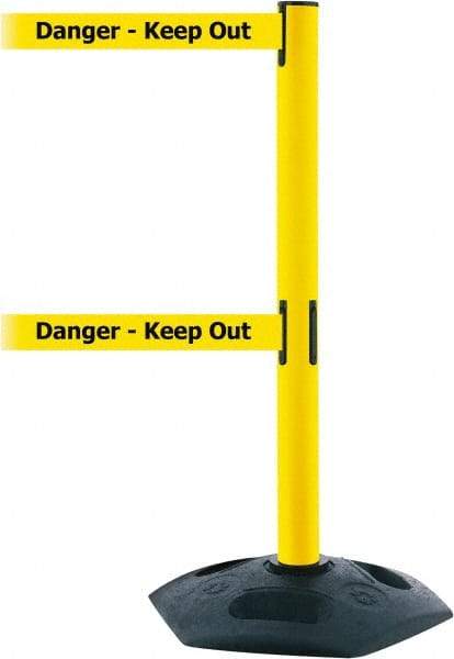 Tensator - 38" High, 2-1/2" Pole Diam, 4 Way Stanchion - 19" Base Diam, Octagon Recycled Rubber Base, Yellow Plastic Post, 13' x 2" Tape, Dual Line Tape, For Outdoor Use - Eagle Tool & Supply