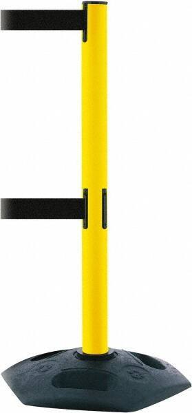 Tensator - 38" High, 2-1/2" Pole Diam, 4 Way Stanchion - 19" Base Diam, Octagon Recycled Rubber Base, Yellow Plastic Post, 13' x 2" Tape, Dual Line Tape, For Outdoor Use - Eagle Tool & Supply