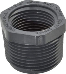 Value Collection - 1 x 3/4" PVC Plastic Pipe Bushing - Schedule 80, MIPT x FIPT End Connections - Eagle Tool & Supply