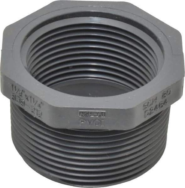 Value Collection - 1-1/2 x 1-1/4" PVC Plastic Pipe Bushing - Schedule 80, MIPT x FIPT End Connections - Eagle Tool & Supply