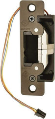 Adams Rite - 4.88" Long x 1-1/4" Wide, Dark Bronze Anodized Aluminum Finish, Electric Door Strike - Field Selectable 12 or 24 VDC & 12-24 VAC, VAC/VDC Power, Zinc Alloy - Eagle Tool & Supply