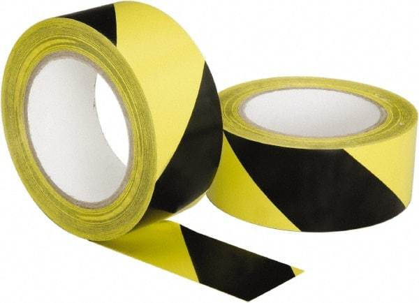 Ability One - Black & Yellow Striped Vinyl Tape - 2" Wide x 108' Long, General Traffic - Eagle Tool & Supply