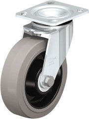 Swivel Top Plate Caster: Rubber, 6-5/16″ Wheel Dia, 2″ Wheel Width, 880 lb Capacity, 7-7/8″ OAH Rubber, 880 Lb Capacity, Ball Bearing, 4 x 4-1/2″ Plate