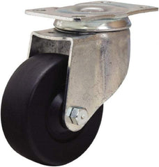 Hamilton - 3-1/2" Diam x 1-1/4" Wide x 4-13/16" OAH Top Plate Mount Swivel Caster - Hard Rubber, 140 Lb Capacity, Self-Lubricating Bearing, 2-1/2 x 3-3/4" Plate - Eagle Tool & Supply