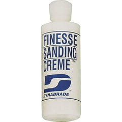 Dynabrade - 4 oz Sanding Creme Compound - Compound Grade Fine, White, For High Glossing, Use on Composites, Fiberglass & Metal - Eagle Tool & Supply