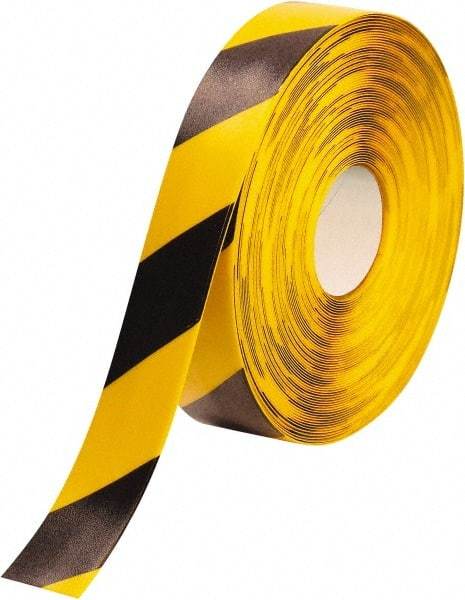 PRO-SAFE - Black & Yellow Striped PVC Tape - 2" Wide x 100' Long x 50 mil Thick, General Traffic - Eagle Tool & Supply