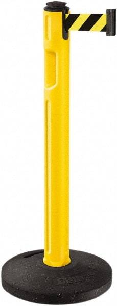 Lavi Industries - 38-1/4" High, 3-1/4" Pole Diam, Stanchion - 16" Base Diam, Dome Recycled Rubber Base, Yellow Plastic Post, 12' x 2" Tape, Single Line Tape, For Outdoor Use - Eagle Tool & Supply