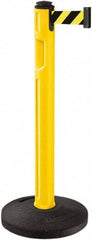 Lavi Industries - 38-1/4" High, 3-1/4" Pole Diam, Stanchion - 16" Base Diam, Dome Recycled Rubber Base, Yellow Plastic Post, 12' x 2" Tape, Single Line Tape, For Outdoor Use - Eagle Tool & Supply