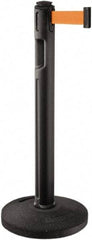 Lavi Industries - 38-1/4" High, 3-1/4" Pole Diam, Stanchion - 16" Base Diam, Dome Recycled Rubber Base, Black Plastic Post, 12' x 2" Tape, Single Line Tape, For Outdoor Use - Eagle Tool & Supply