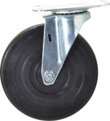 E.R. Wagner - 5" Diam x 1" Wide x 5-13/16" OAH Top Plate Mount Swivel Caster - Hard Rubber, 145 Lb Capacity, Delrin Bearing, 2-3/4 x 3-3/4" Plate - Eagle Tool & Supply