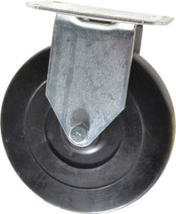 E.R. Wagner - 5" Diam x 1" Wide x 5-13/16" OAH Top Plate Mount Rigid Caster - Hard Rubber, 145 Lb Capacity, Delrin Bearing, 2-3/4 x 3-3/4" Plate - Eagle Tool & Supply