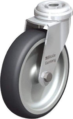 Blickle - 4" Diam x 63/64" Wide x 4-49/64" OAH Hollow Kingpin Mount Swivel Caster - Rubber Elastomer (TPE), 154 Lb Capacity, Plain Bore Bearing, Hollow Kingpin Stem - Eagle Tool & Supply