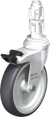 Blickle - 4" Diam x 63/64" Wide x 4-7/8" OAH Metal Expander Mount Swivel Caster with Brake - Rubber Elastomer (TPE), 154 Lb Capacity, Plain Bore Bearing, Metal Expander Stem - Eagle Tool & Supply