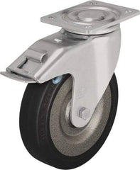 Blickle - 6-1/2" Diam x 1-31/32" Wide x 7-61/64" OAH Top Plate Mount Swivel Caster with Brake - Solid Rubber, 990 Lb Capacity, Ball Bearing, 5-1/2 x 4-3/8" Plate - Eagle Tool & Supply