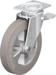Blickle - 10" Diam x 2" Wide x 11-39/64" OAH Top Plate Mount Swivel Caster with Brake - Solid Rubber, 1,430 Lb Capacity, Ball Bearing, 5-1/2 x 4-3/8" Plate - Eagle Tool & Supply