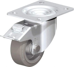 Blickle - 4" Diam x 1-37/64" Wide x 5-7/64" OAH Top Plate Mount Swivel Caster with Brake - Solid Rubber, 440 Lb Capacity, Ball Bearing, 5-1/2 x 4-3/8" Plate - Eagle Tool & Supply