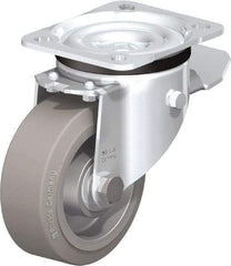 Blickle - 4" Diam x 1-37/64" Wide x 5-7/64" OAH Top Plate Mount Swivel Caster with Brake - Solid Rubber, 440 Lb Capacity, Ball Bearing, 3-15/16 x 3-3/8" Plate - Eagle Tool & Supply