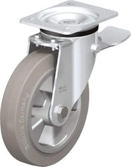 Blickle - 8" Diam x 1-31/32" Wide x 9-41/64" OAH Top Plate Mount Swivel Caster with Brake - Solid Rubber, 1,100 Lb Capacity, Ball Bearing, 5-1/2 x 4-3/8" Plate - Eagle Tool & Supply