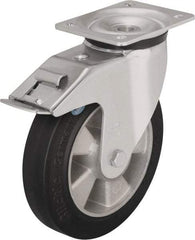 Blickle - 5" Diam x 1-31/32" Wide x 6-11/16" OAH Top Plate Mount Swivel Caster with Brake - Solid Rubber, 594 Lb Capacity, Ball Bearing, 5-1/2 x 4-3/8" Plate - Eagle Tool & Supply