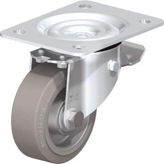 Blickle - 4" Diam x 1-37/64" Wide x 5-7/64" OAH Top Plate Mount Swivel Caster with Brake - Solid Rubber, 440 Lb Capacity, Ball Bearing, 5-1/2 x 4-3/8" Plate - Eagle Tool & Supply
