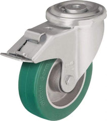 Blickle - 5" Diam x 1-37/64" Wide x 6-7/64" OAH Hollow Kingpin Mount Swivel Caster with Brake - Polyurethane-Elastomer Blickle Softhane, 770 Lb Capacity, Ball Bearing, Hollow Kingpin Stem - Eagle Tool & Supply