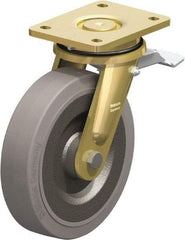 Blickle - 8" Diam x 1-31/32" Wide x 9-41/64" OAH Top Plate Mount Swivel Caster with Brake - Solid Rubber, 1,320 Lb Capacity, Ball Bearing, 5-1/2 x 4-3/8" Plate - Eagle Tool & Supply