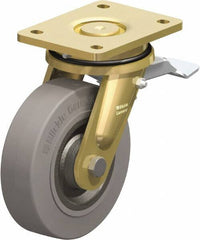 Blickle - 6-1/2" Diam x 1-31/32" Wide x 8-1/16" OAH Top Plate Mount Swivel Caster with Brake - Solid Rubber, 990 Lb Capacity, Ball Bearing, 5-1/2 x 4-3/8" Plate - Eagle Tool & Supply