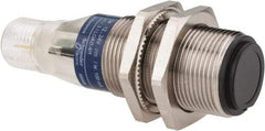 Telemecanique Sensors - 4 Pin M12 Connector, 15m Nominal Distance, Shock and Vibration Resistant, Through Beam Photoelectric Sensor - 12 to 24 VDC, 500 Hz, Nickel Plated Brass, 2.36 Inch Long x 0.71 Inch Wide - Eagle Tool & Supply