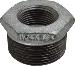 B&K Mueller - Class 150, 1-1/4 x 3/4" Galvanized Pipe Hex Bushing - Threaded, Malleable Iron - Eagle Tool & Supply