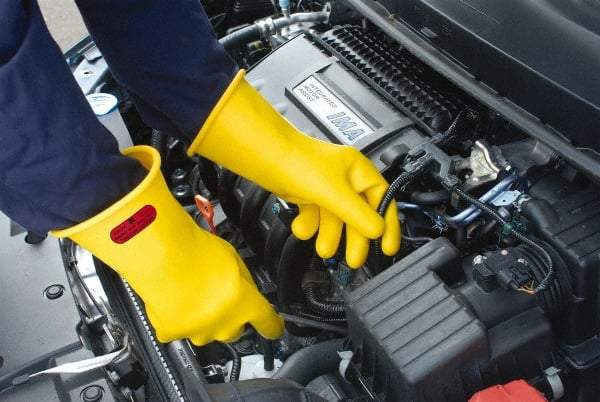 Ansell - Class 0, Size 10, 11" Long, Rubber Lineman's Glove - 5,000 AC Max Use Voltage, 1,000 AC Test Voltage, Yellow, ASTM D120 - Eagle Tool & Supply