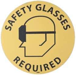 NMC - Safety Glasses Required, Anti-Skid Pressure-Sensitive Vinyl Floor Sign - Round, Black on Yellow, Adhesive Backed, For Accident Prevention - Eagle Tool & Supply