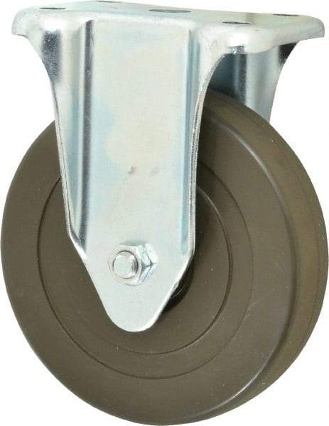 Albion - 5" Diam x 1-1/4" Wide x 6-15/32" OAH Top Plate Mount Rigid Caster - Hard Rubber, 290 Lb Capacity, Self-Lubricating Bearing, 2-7/8 x 3-5/8" Plate - Eagle Tool & Supply
