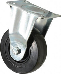 Fairbanks - 4" Diam x 1-1/4" Wide x 5-13/32" OAH Top Plate Mount Rigid Caster - Hard Rubber, 275 Lb Capacity, Self-Lubricating Bearing, 2-7/8 x 3-5/8" Plate - Eagle Tool & Supply