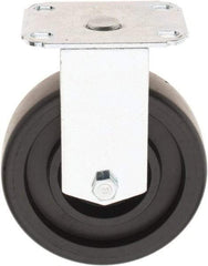 E.R. Wagner - 5" Diam x 1-1/4" Wide x 6-1/4" OAH Top Plate Mount Rigid Caster - Polyolefin, 450 Lb Capacity, Delrin Bearing, 2-3/4 x 3-3/4" Plate - Eagle Tool & Supply