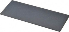 Norton - 4-1/2" Long x 1-3/4" Diam x 1/4" Thick, Silicon Carbide Sharpening Stone - Round, Fine Grade - Eagle Tool & Supply