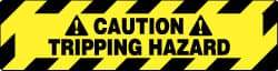 NMC - Caution - Tripping Hazard, Anti-Skid Pressure-Sensitive Vinyl Floor Sign - Rectangle, Black on Yellow, Adhesive Backed, For Accident Prevention - Eagle Tool & Supply