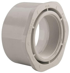 Value Collection - 6 x 4" PVC Plastic Pipe Bushing - Schedule 40, Spig x FIPT End Connections - Eagle Tool & Supply