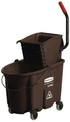 Rubbermaid - 35 Qt Plastic Bucket & Wringer - 20-1/8" Long x 36-1/2" High x 15-3/4" Wide, Brown - Eagle Tool & Supply