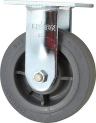 Albion - 6" Diam x 2" Wide x 7-1/2" OAH Top Plate Mount Rigid Caster - Soft Rubber, 600 Lb Capacity, Precision Sealed Bearing, 4 x 4-1/2" Plate - Eagle Tool & Supply